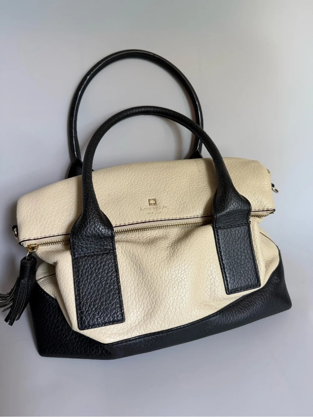 kate spade Cream and Black Pebbled Leather Satchel with Tassel